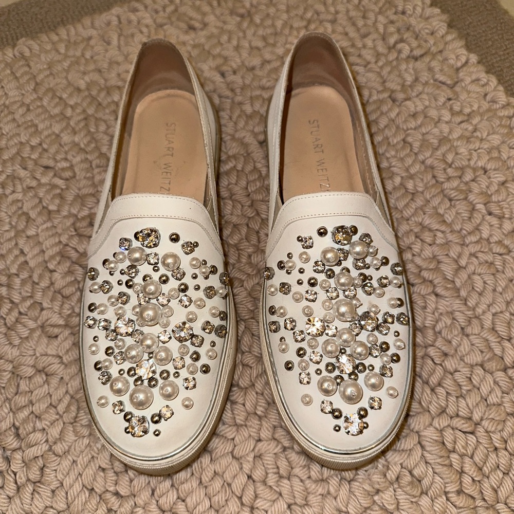 Stuart Weitzman white slip ons